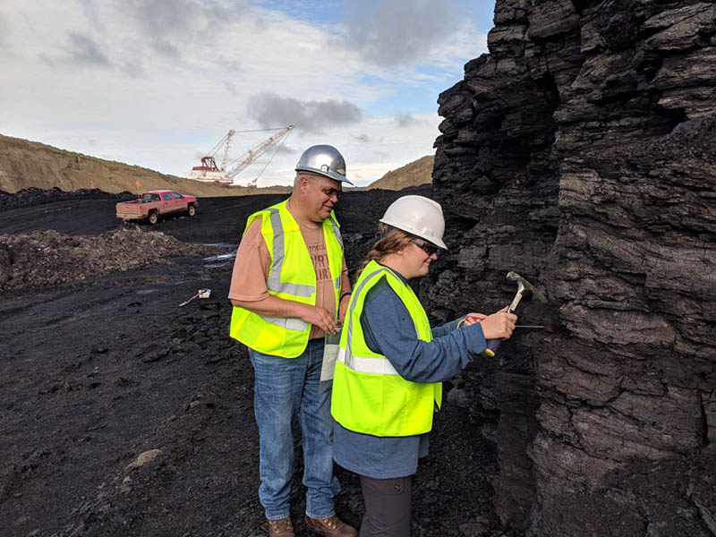 Scientists gathering samples for x-ray spectroscopy testing at a coal mine