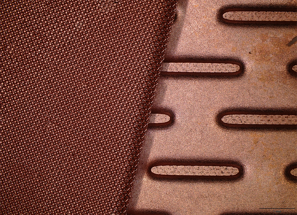 Inside the iPhone 17 Pro's vapor chamber, a woven copper lattice wicks and condenses the working fluid that carries heat away from the chip.