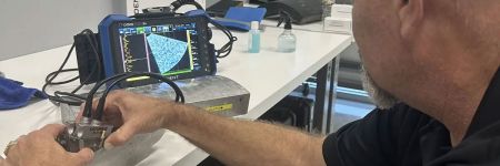 Evaluating an arrays SNR on a noisy vintage cast austenitic stainless steel cal block